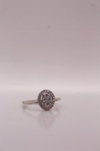 Dazzling Oval Halo Cluster Ring