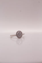 Dazzling Oval Halo Cluster Ring