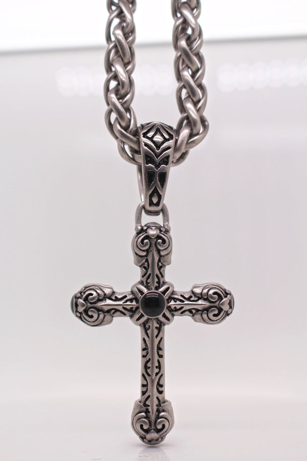 The Intricate Knot Cross