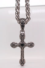 The Intricate Knot Cross