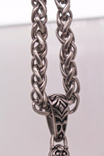 The Intricate Knot Cross