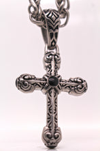The Intricate Knot Cross
